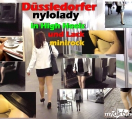 Düsseldorfer Glamour Nylonlady in High Heels und Lack minirock